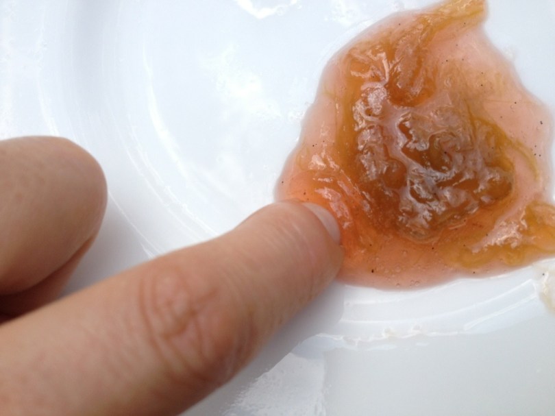 TAKE THE JAM OFF THE HEAT. Place a splodge of jam on the chilled plate and leave for a minute. Does it wrinkle when you push it with your finger? If so it is ready. Otherwise get that jam back to the boil for another minute and test again,