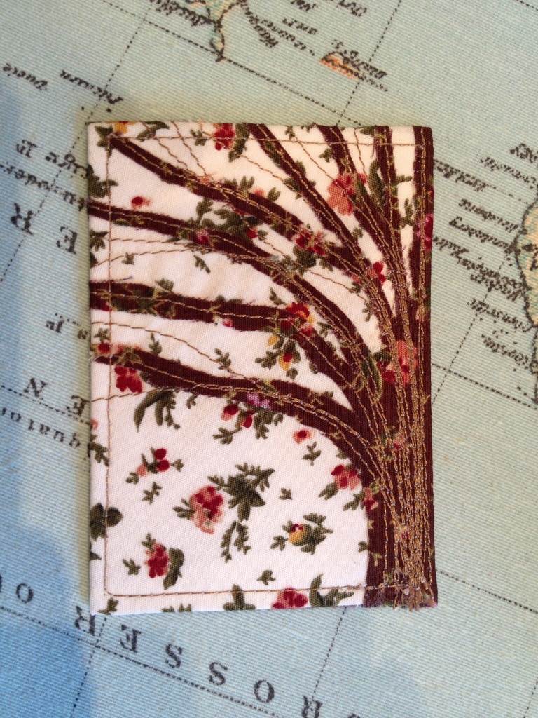 A little top stitching to complete the card.