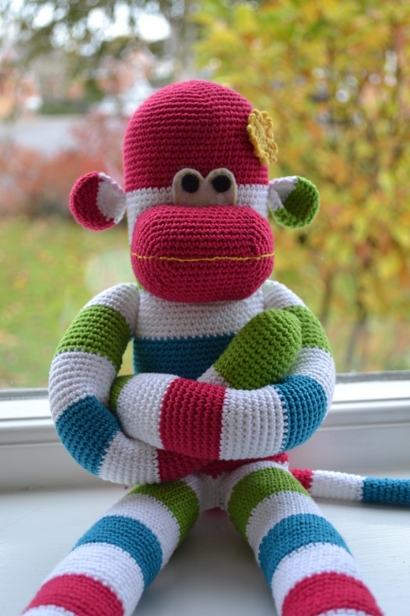 Crochet sock monkey.  Pattern by Craft Passion