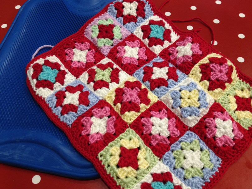 Crochet granny squares. First side assembled