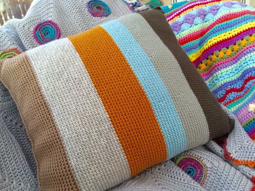 Colour block crochet cushion